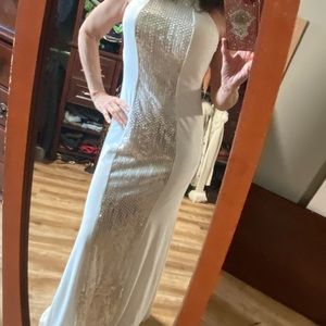 Cream colored, sequin formal gown